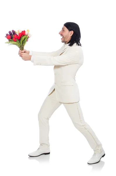 Homem com flores de tulipa — Fotografia de Stock