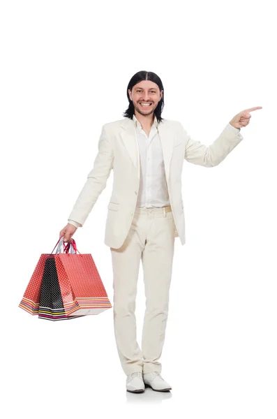 Hombre con bolsas aisladas en blanco — Foto de Stock