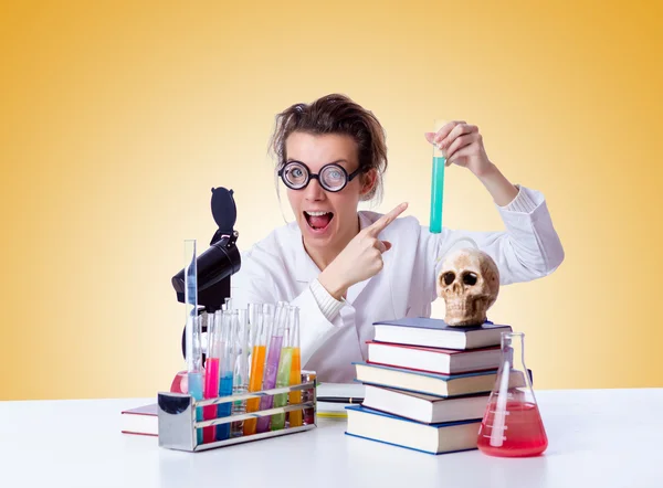 Crazy female chemist in lab — Stock Photo, Image