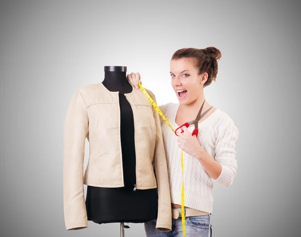 Woman tailor working on dress — Stock Photo, Image