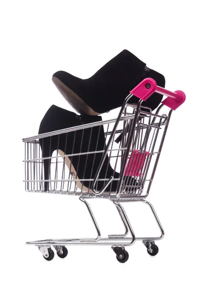 Woman shoes in shopping cart on white — Stock Photo, Image