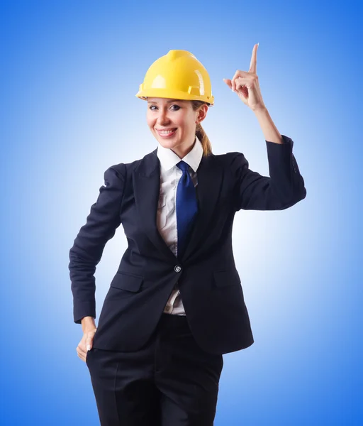Young businesswoman with hard hat — Stock Photo, Image