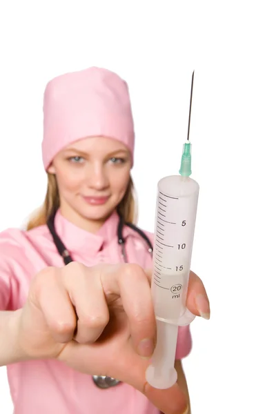 Woman doctor with syringe on white — Stock Photo, Image