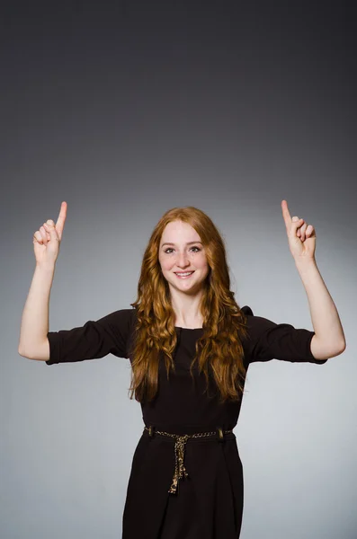 Pretty red hair girl in brown dress — Stock Photo, Image