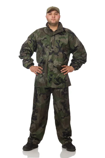 Mladý muž v uniformě vojáka izolovaný na bílém — Stock fotografie