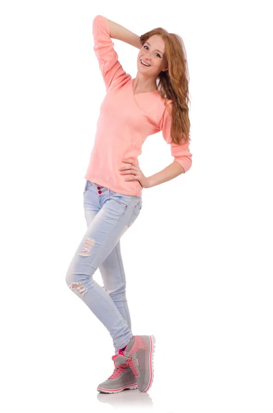Linda chica sonriente en blusa rosa y jeans aislados en blanco — Foto de Stock