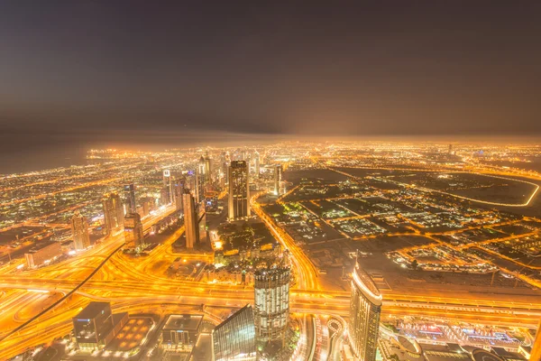 Panorama of night Dubai during sunset — Stock Photo, Image