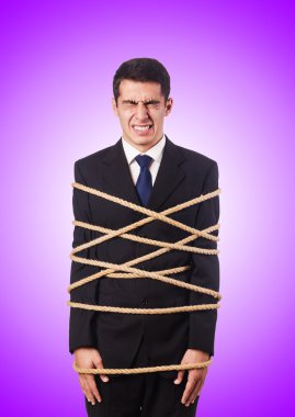 Degrade karşı iple bağlanmış iş adamı 