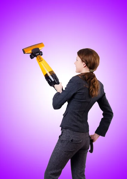 Young woman with vacuum cleaner — Stock Photo, Image