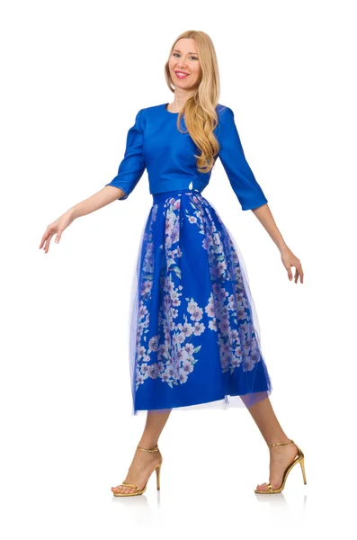 Kvinna i blå klänning med blomma utskrifter — Stockfoto