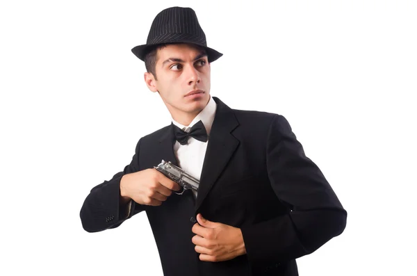 Jovem homem elegante segurando arma isolada no branco — Fotografia de Stock