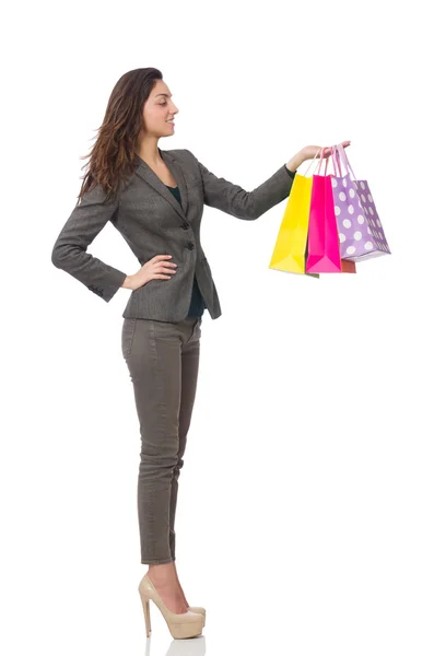 Mulher atraente com sacos de compras isolados em branco — Fotografia de Stock