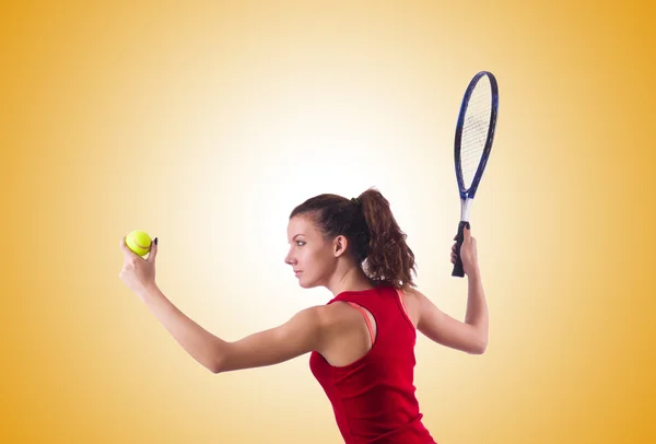 Woman playing tennis — Stock Photo, Image
