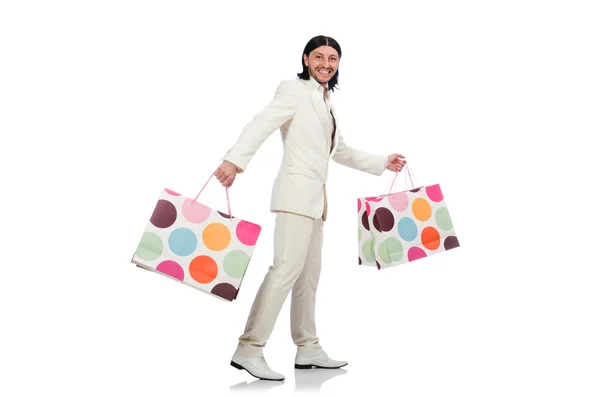 Homme avec sacs à provisions isolé sur blanc — Photo