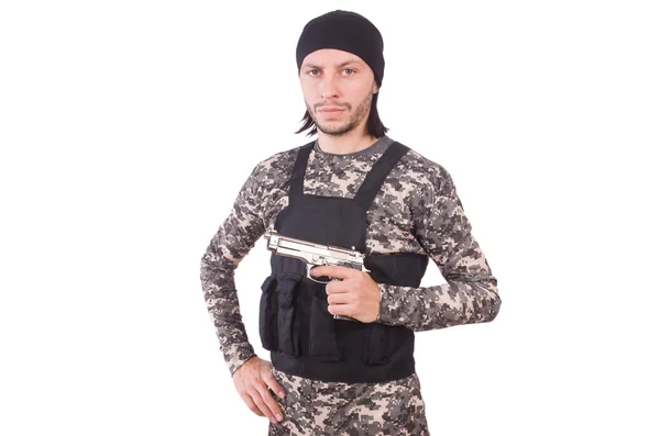Young man in military uniform holding gun isolated on white — Stock Photo, Image