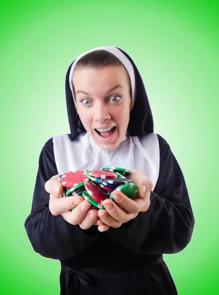 Nun in the gambling concept — Stock Photo, Image