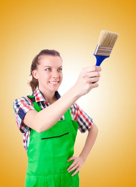 Woman painter with paintbrush — Stock Photo, Image