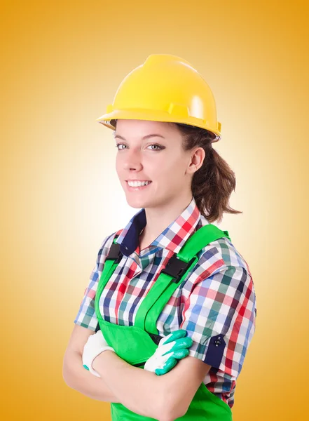 Budowniczy kobieta przed gradientu — Zdjęcie stockowe