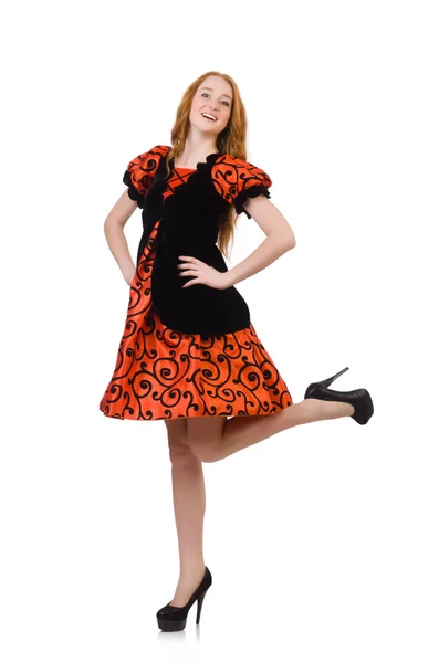 Рыжая девушка в оранжевом платье — стоковое фото