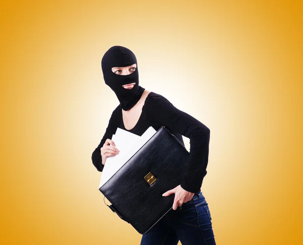 Industrial espionage concept with person in balaclava — Stock Photo, Image