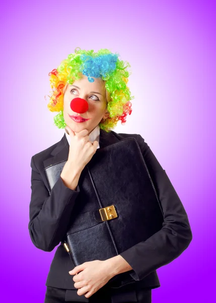 Woman clown in business suit — Stock Photo, Image