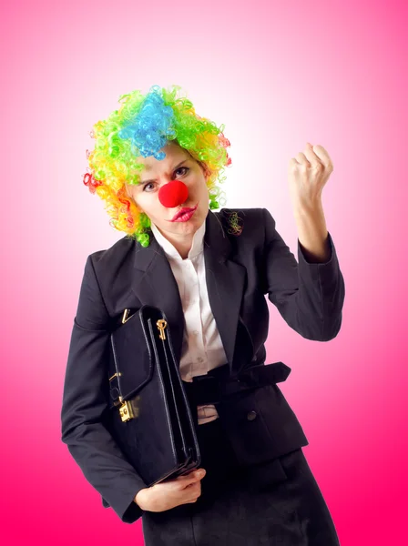 Woman clown in business suit — Stock Photo, Image