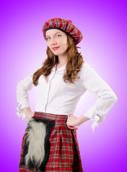 Young woman in traditional scottish clothing — Stock Photo, Image