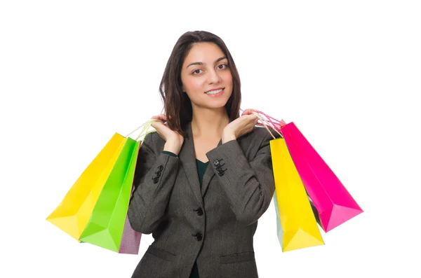 Mulher atraente com sacos de compras isolados em branco — Fotografia de Stock