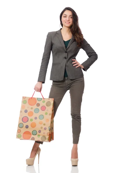 Mujer atractiva con bolsas aisladas en blanco — Foto de Stock