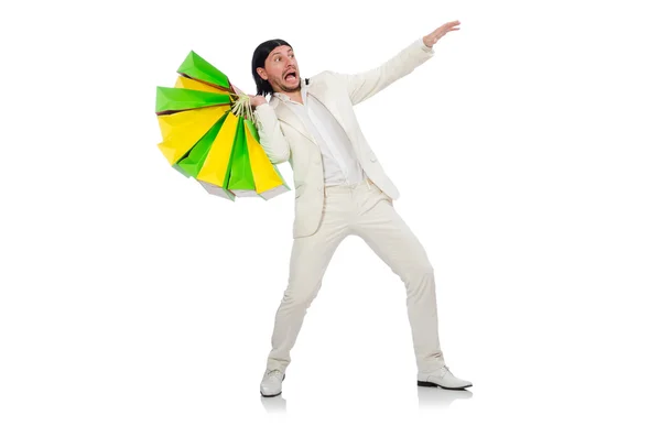 Hombre con bolsas aisladas en blanco — Foto de Stock