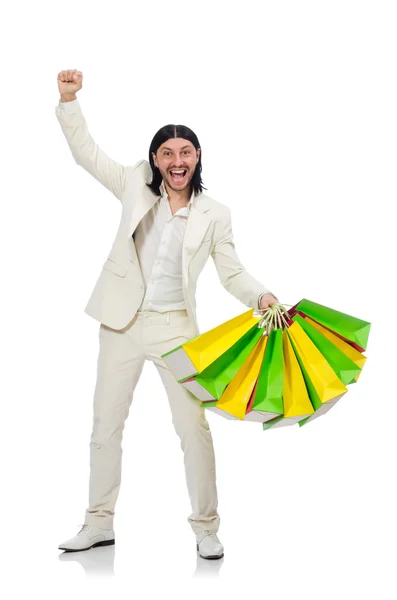 Homem com sacos de compras isolados em branco — Fotografia de Stock