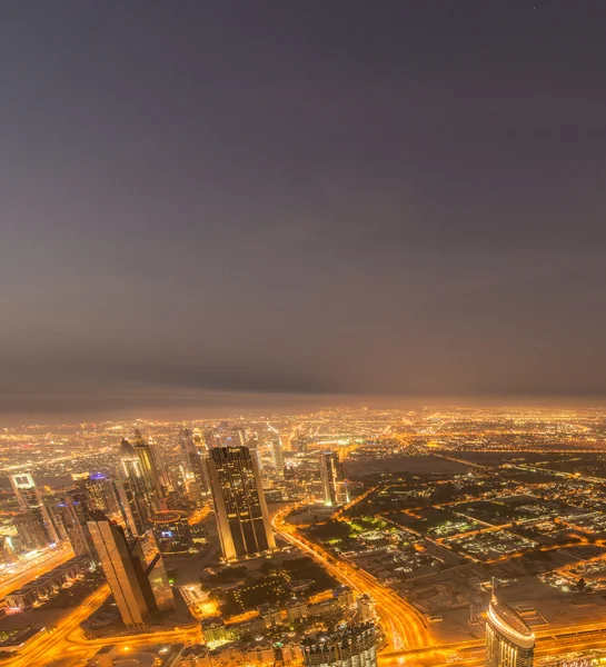 Panorama de la noche Dubai durante la puesta del sol —  Fotos de Stock