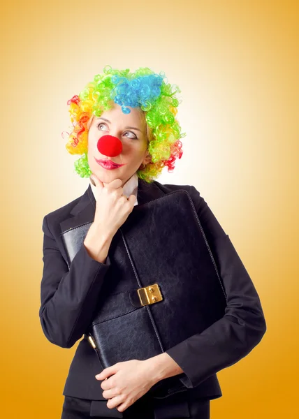 Woman clown in business suit — Stock Photo, Image