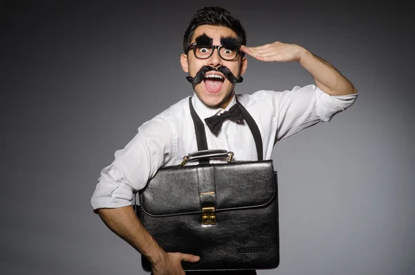 Joven con bigote falso aislado en gris —  Fotos de Stock