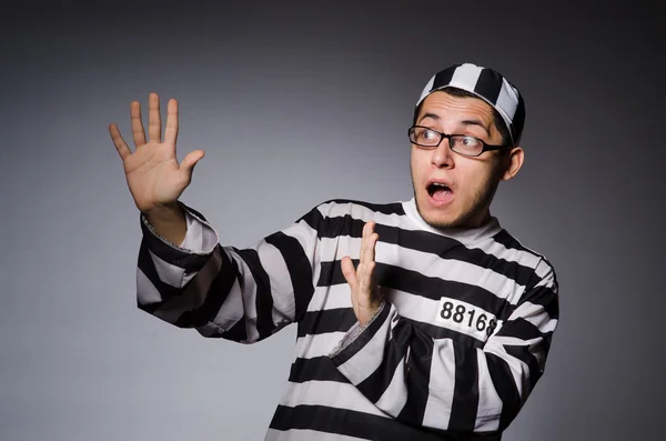 Funny prisoner isolated on gray — Stock Photo, Image