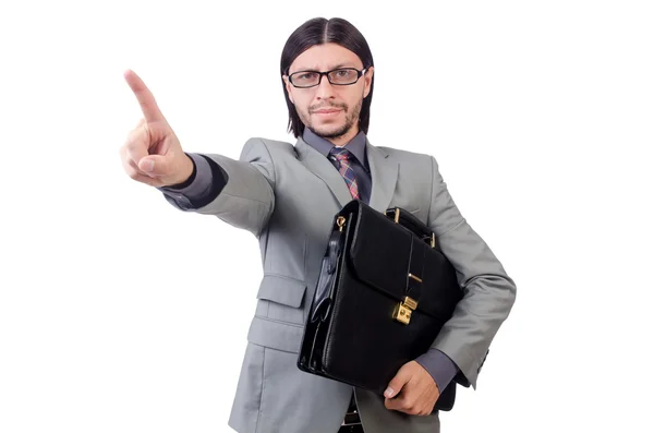 Giovane uomo d'affari in tuta grigia con valigetta isolata su bianco — Foto Stock
