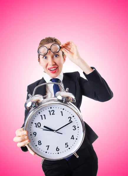 Businesswoman with alarm clock — Stock Photo, Image