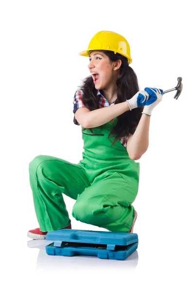 Женщина-рабочий в зеленом комбинезоне изолирована на белом — стоковое фото