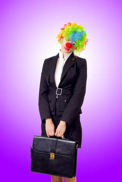 Woman clown in business suit — Stock Photo, Image