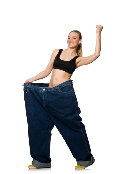 Dieting concept with big jeans on white — Stock Photo, Image