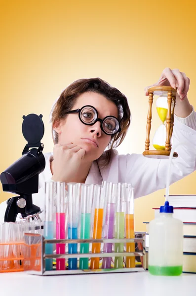 Crazy woman chemist in lab — Stock Photo, Image