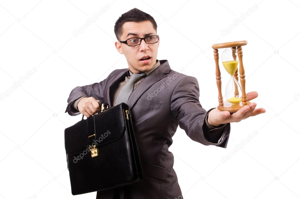Young man holding briefcase and sandglass isolated on white