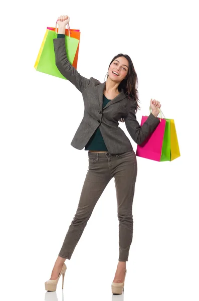 Mulher atraente com sacos de compras isolados em branco — Fotografia de Stock