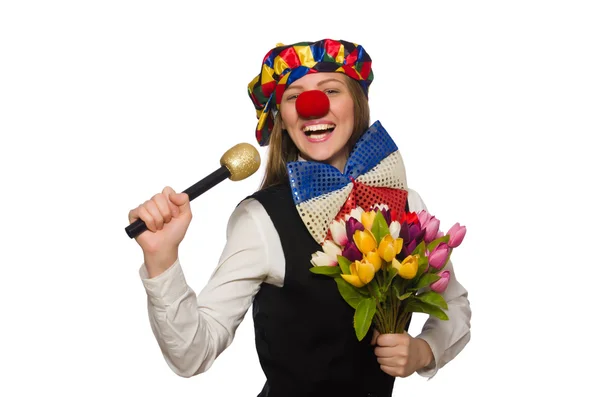 Bonito payaso femenino con flores aisladas en blanco — Foto de Stock