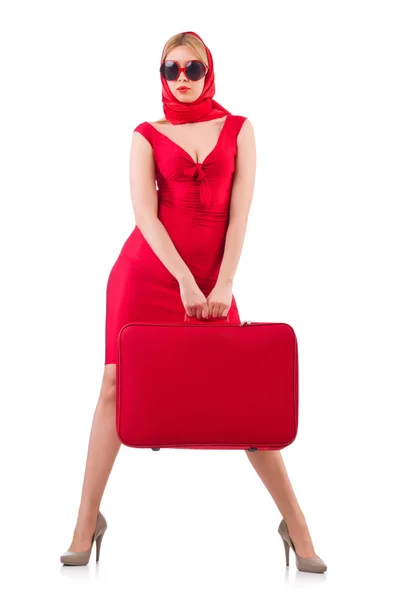 Blondie w czerwonej sukience z walizką — Zdjęcie stockowe