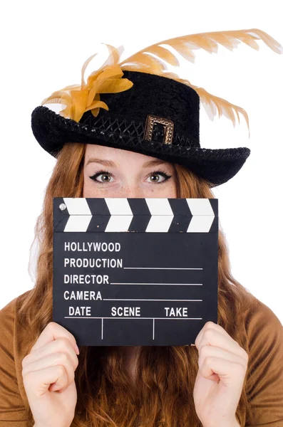 Girl in hat holding clapperboard — Stock Photo, Image