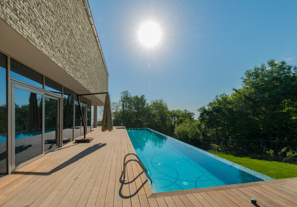 Infinity pool on the bright summer day