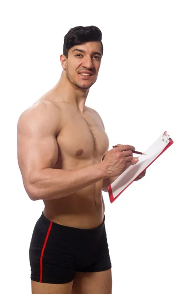 Muscular man with blank pad isolated on white — Stock Photo, Image