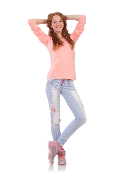 Schattige lachende meisje in roze blouse en jeans geïsoleerd op wit — Stockfoto