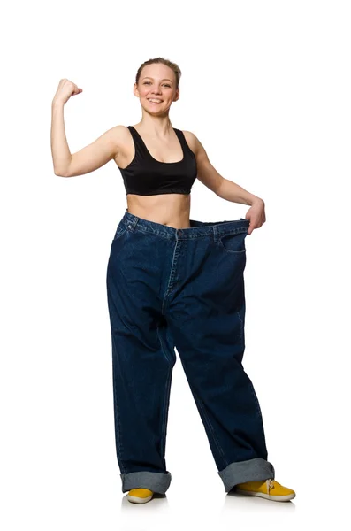 Dieting concept with big jeans on white — Stock Photo, Image